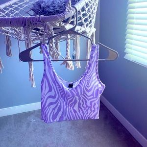 This is a purple zebra striped crop top.